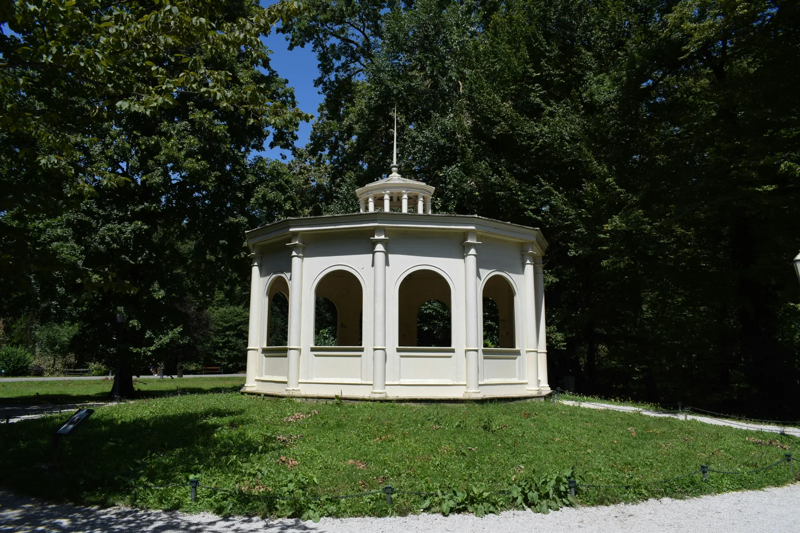 White pavilion structure in a public park