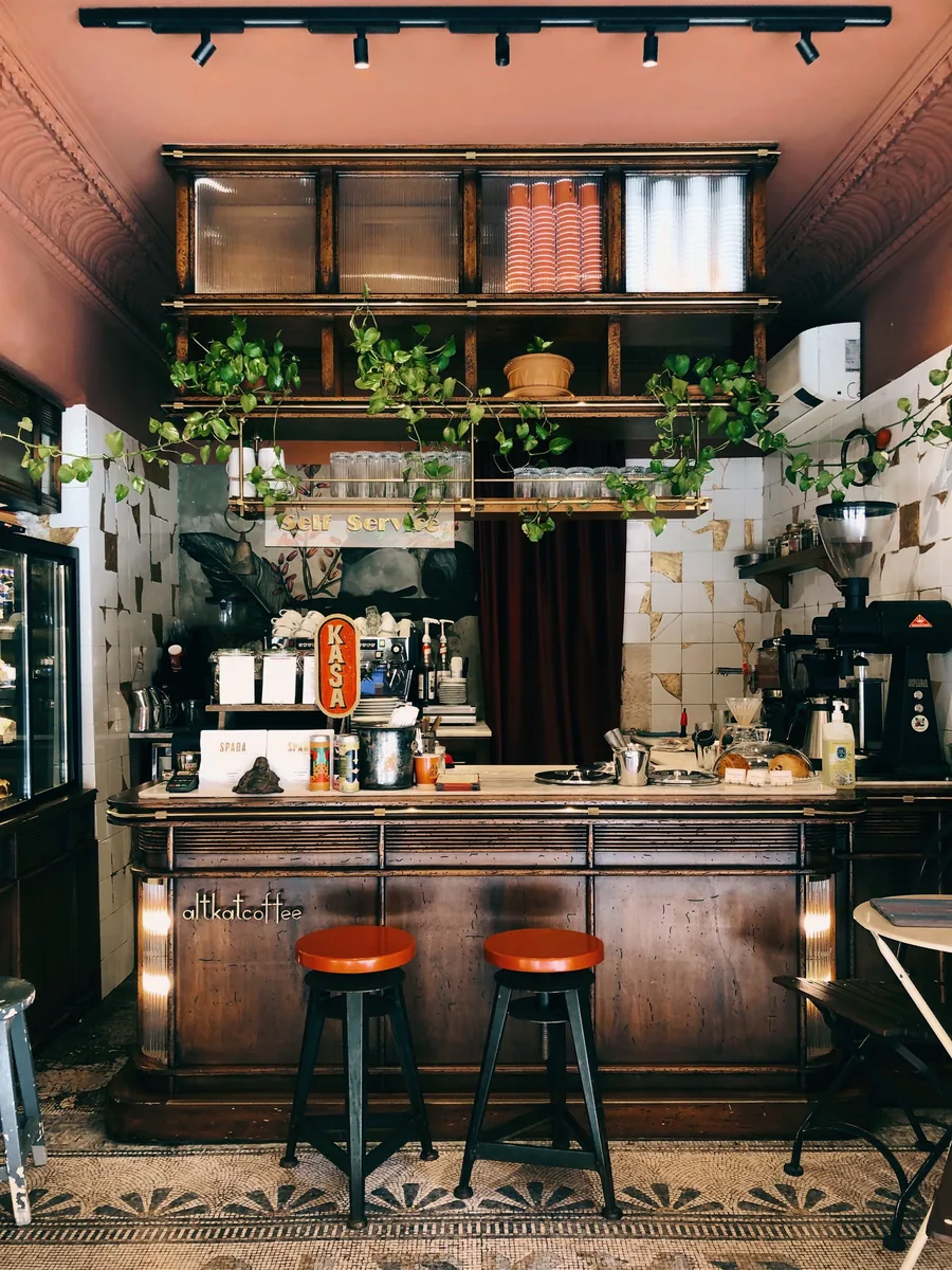 Warmly lit bar counter in a restaurant interior